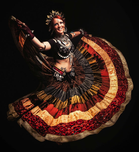 Firefly belly dancer twirling in full skirt Christchurch
