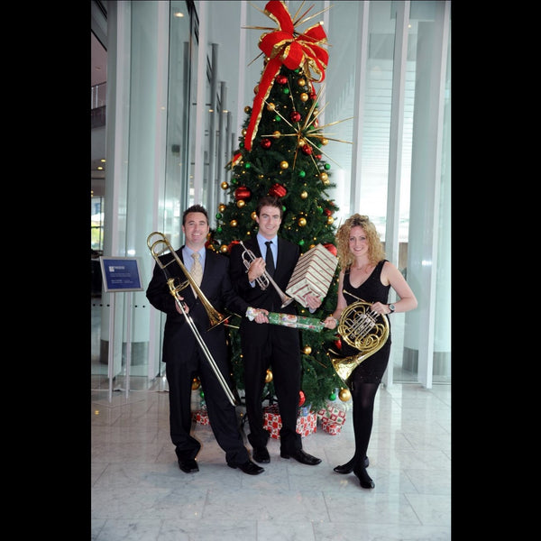 Ace Brass classical trio with Christmas tree