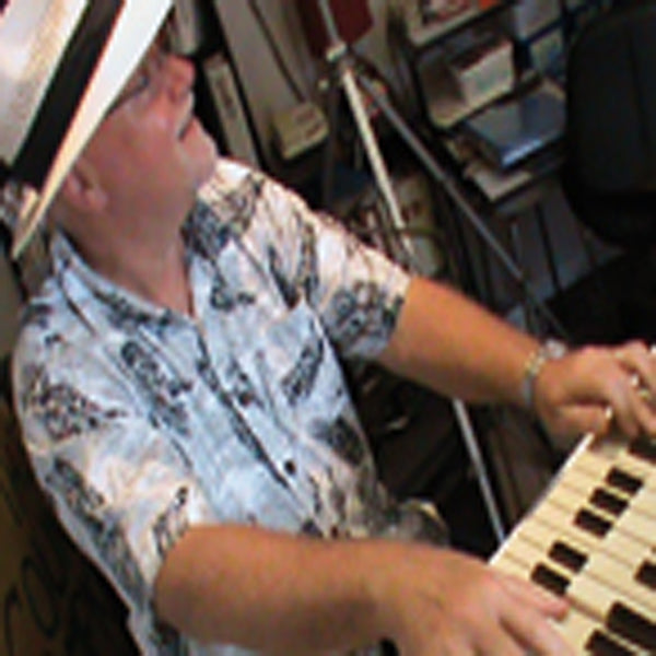 Barry Korcheski playing keyboards