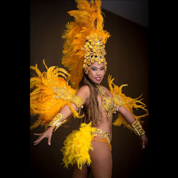 Brazilian Dancers Auckland sunset orange gold feathers and jewels costume