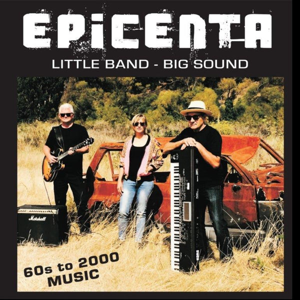 Epicenta band in front of burned out car