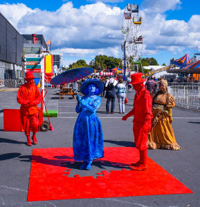 Free Lunch blue and red characters at event Hamilton