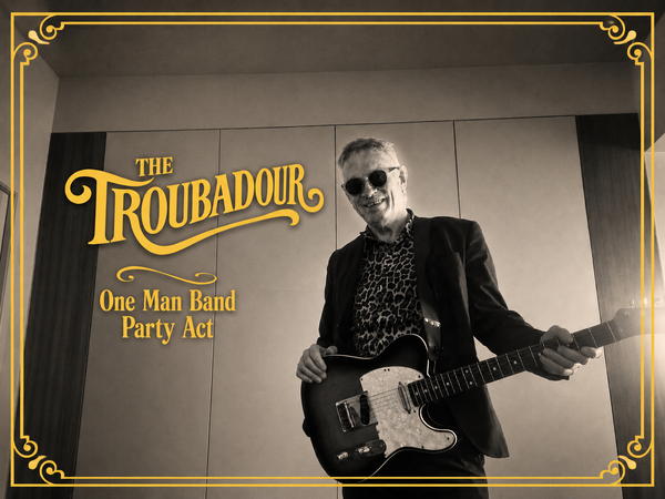 The Troubador - Solo Singer/Guitarist with backing tracks or with his full live band