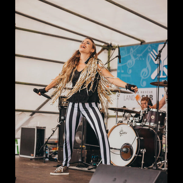 Monroes covers band Hamilton lead singer on stage
