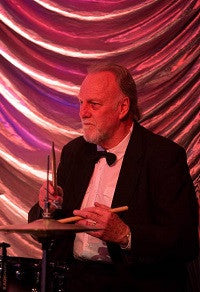 Frank playing drums in jazz band at Sky City, Auckland