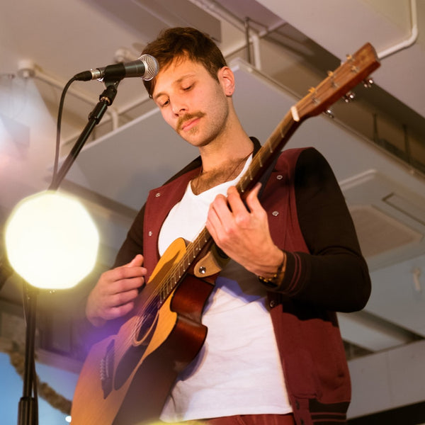 Ant Tarrant playing guitar Auckland