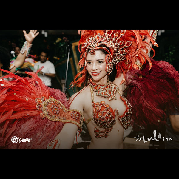 Brazilian Dancers orange feathers costume