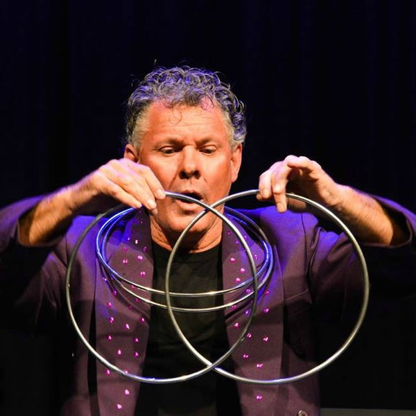 Auckland Magician Brent McLeod with joined rings