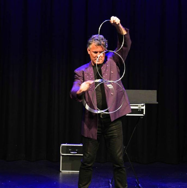 Joined metal rings Auckland Magician Brent McLeod