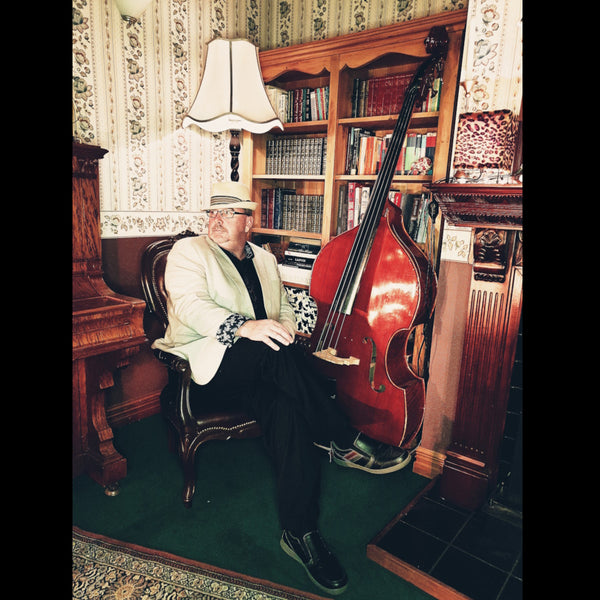 The Curio Club double bass player