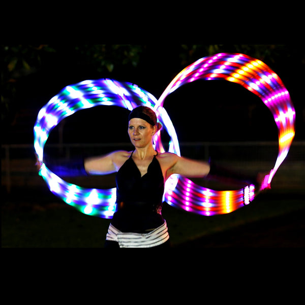 Grace Raven with LED glow hoops Tauranga