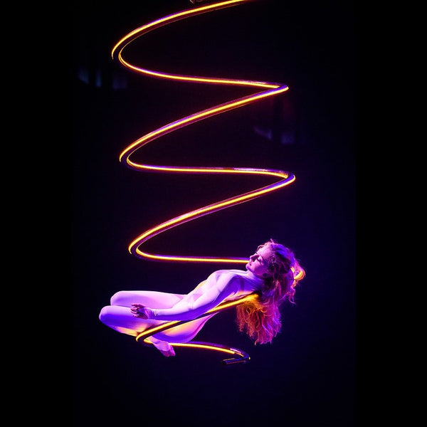 Imogen Stone aerial performer in gold coil Wellington