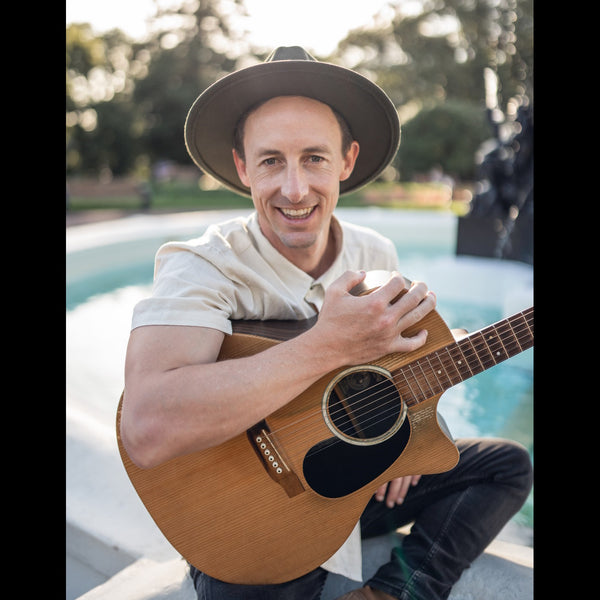 singer guitarist Stu J with guitar